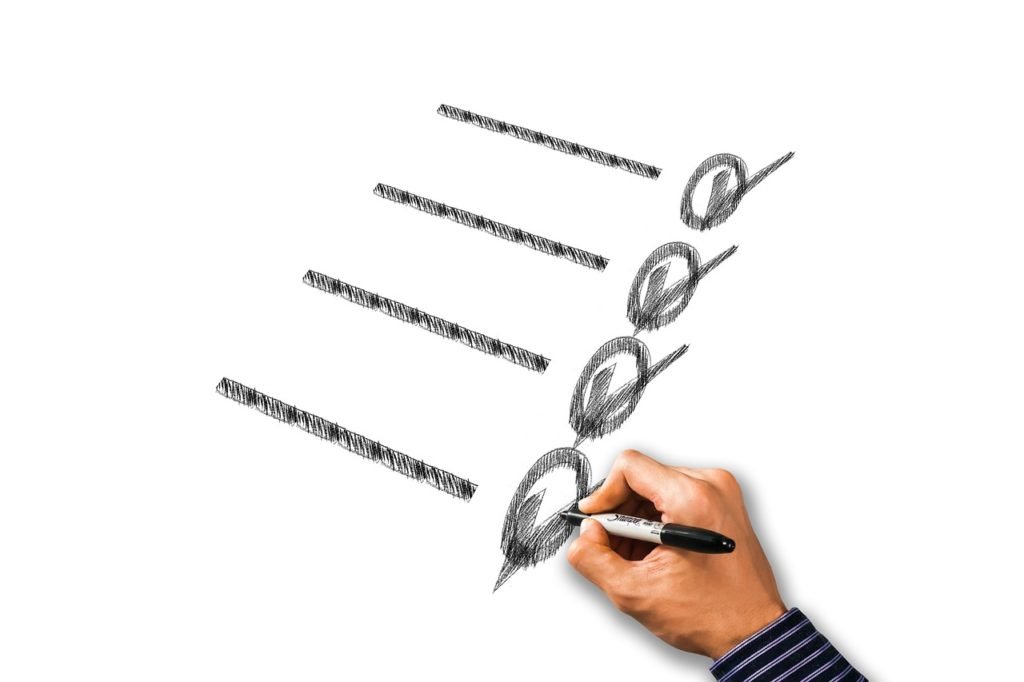hand making check marks