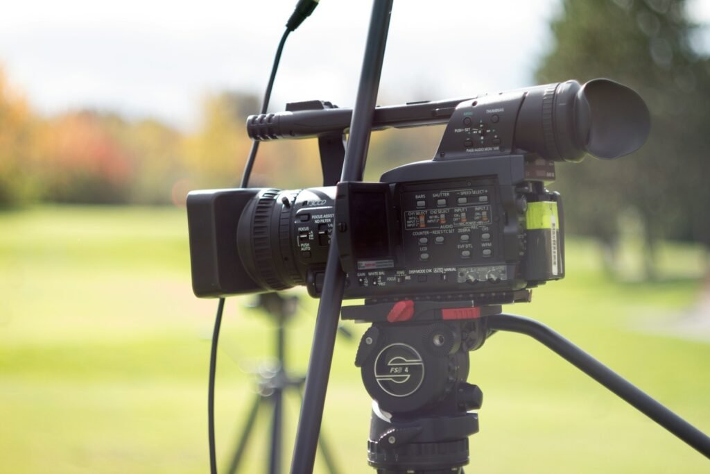black camcorder on tripod